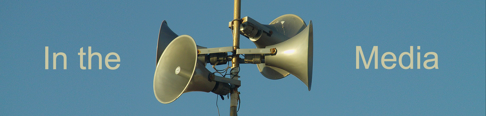 Public loudspeakers. Text: In the mediaץ